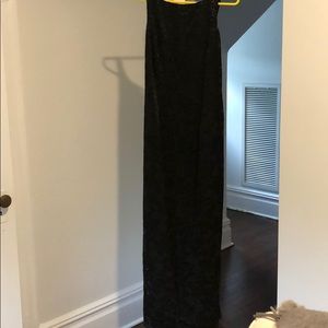 Long black evening gown with velvet floral overlay
